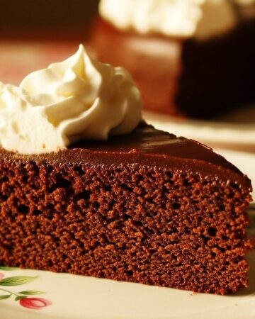 slice of chocolate diet coke cake with whipped topping