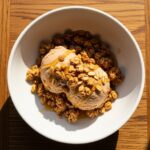 Cinnamon protein Ninja Creami ice cream topped with granola