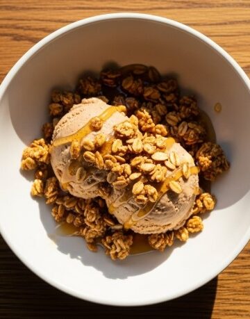 Cinnamon protein Ninja Creami ice cream topped with granola