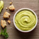 Bowl of finished pistachio cream with toast crumbs